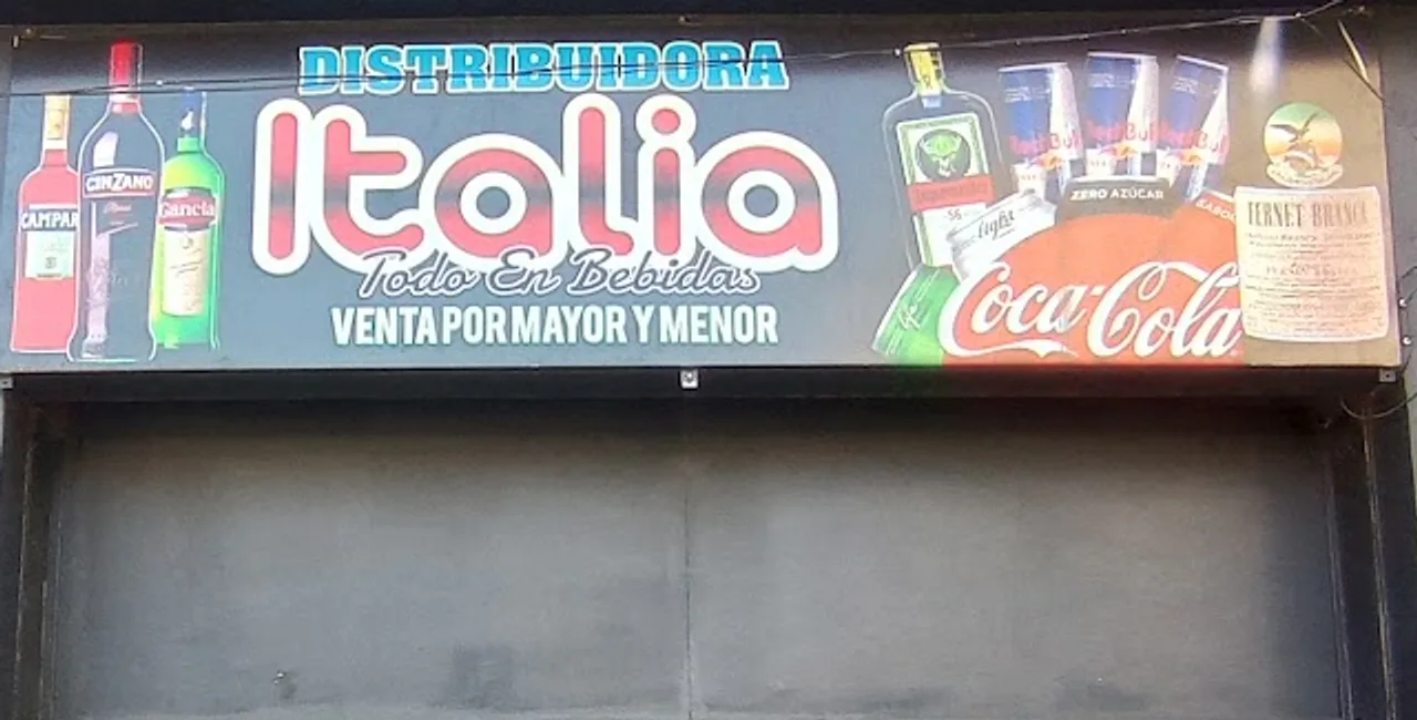Cartel de la sucursal Barracas: Distribuidora Italia, todo en bebidas, venta por mayor y menor